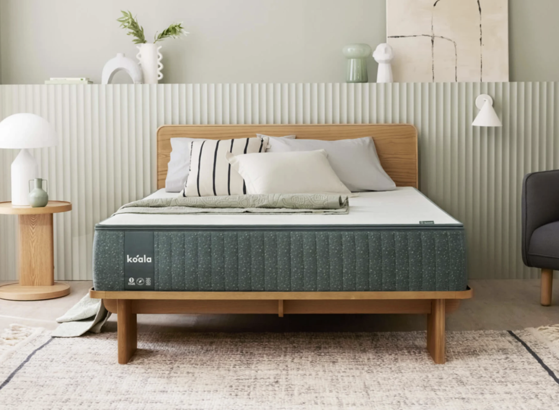 koala plus mattress on a wooden bed-frame